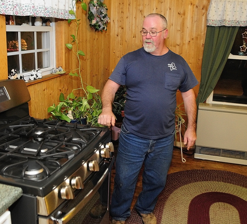 Dick Gagnon expects to save $700 a year by switching from propane to natural gas in his Augusta home.