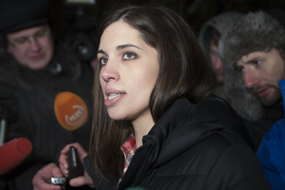 Nadezhda Tolokonnikova of the Russian punk band Pussy Riot speaks to the media after leaving prison Monday. She and bandmate Maria Alyokhina, who was also freed Monday, say they intend to focus on human-right activities.