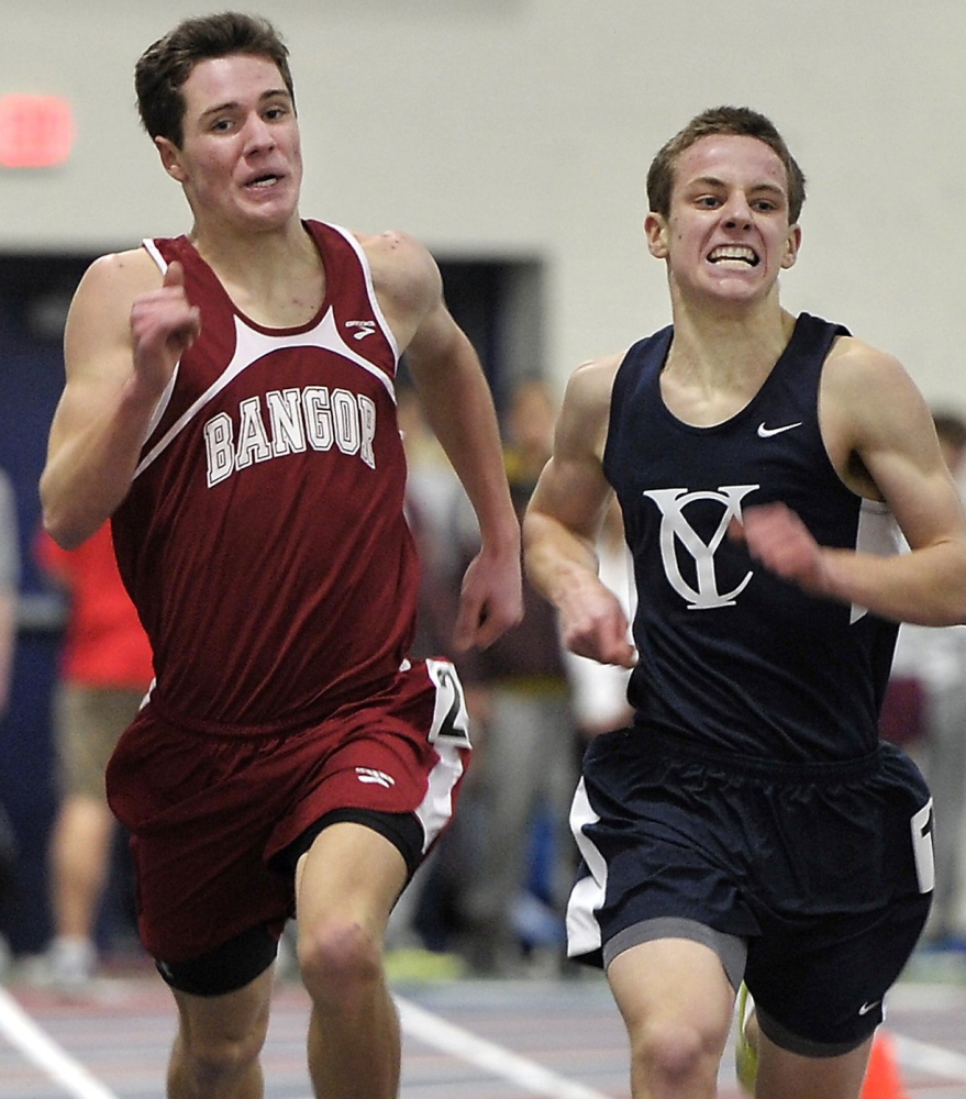 Ben Decker of Yarmouth, right, not only beat Jonathan Stanhope of Bangor to win the mile in the USM New Year’s Relays and Maine pentathlon championship a year ago, but went on to finish second in the 2-mile at the Class B state meet. This year? He’s definitely a contender as a senior.