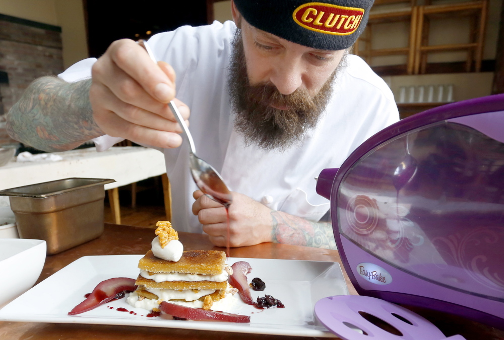 Brant Dadaleares, a pastry chef at Fore Street, makes his maple creme brulee napoleon.