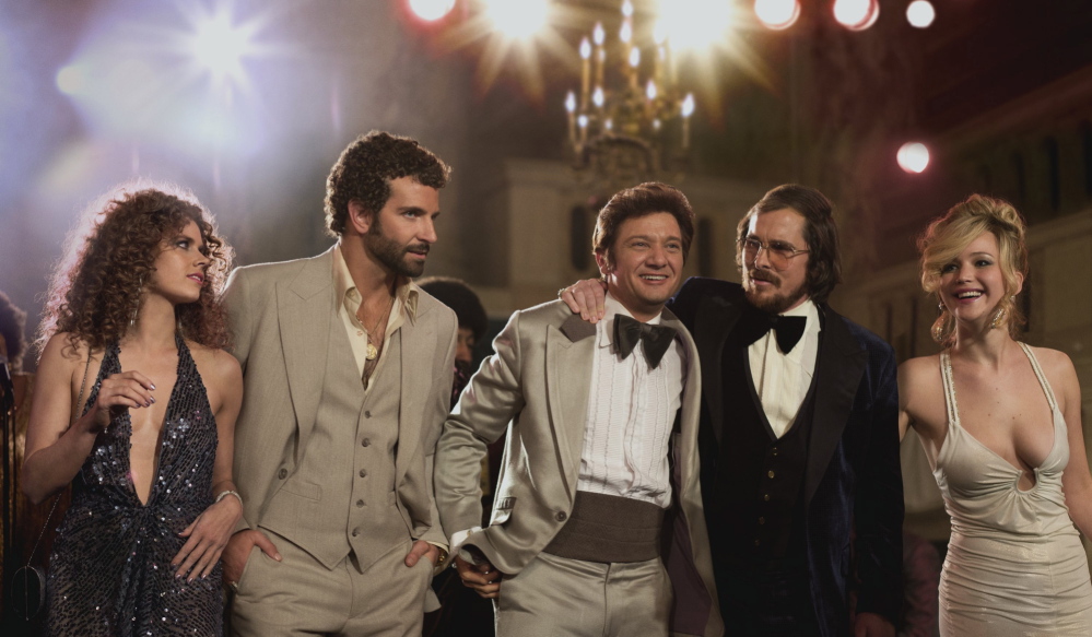“American Hustle” stars, from left, Amy Adams, Bradley Cooper, Jeremy Renner, Christian Bale and Jennifer Lawrence.
