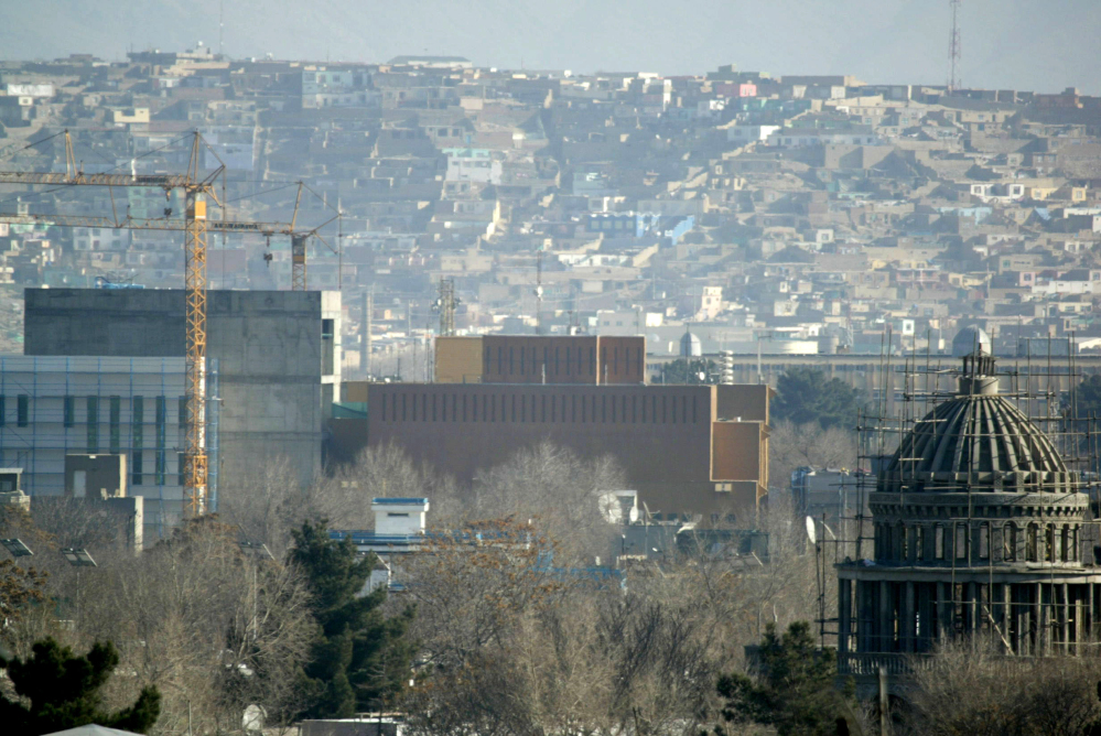 A general view of the U.S. Embassy in Kabul, Afghanistan after it was hit by rocket fire in Kabul, Afghanistan, Wednesday, Dec. 25, 2013. The U.S. Embassy in Afghanistan says its compound was hit by indirect fire just before dawn on Christmas Day. It says no Americans were injured.