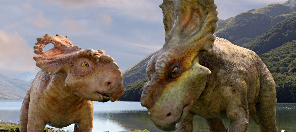 Patchi, left, appears with his older brother Scowler in a scene from the film “Walking with Dinosaurs.”