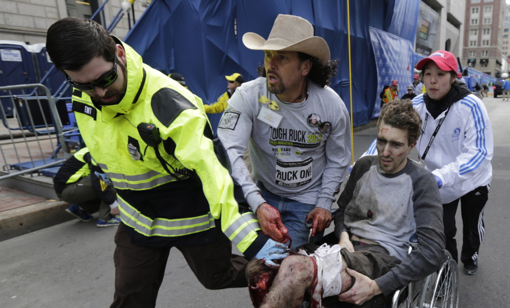 The Boston Marathon bombings that injured Jeff Bauman and so many others was the top sports story of 2013 in an annual Associated Press survey, followed by accounts of legal disputes and arrests.