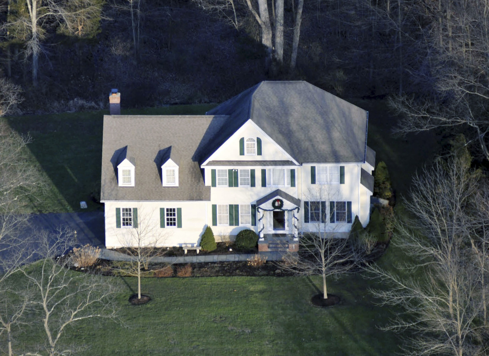 This photo released by Connecticut State Police on Friday, Dec. 27, 2013 shows an aerial view of the home where Adam Lanza lived with his mother in Newtown, Conn. Lanza gunned down 20 first-graders and six educators with a semi-automatic rifle at Sandy Hook Elementary School on Dec. 14, 2012, in Newtown, after killing his mother inside their home. Lanza committed suicide with a handgun as police arrived at the school. (AP Photo/Connecticut State Police)