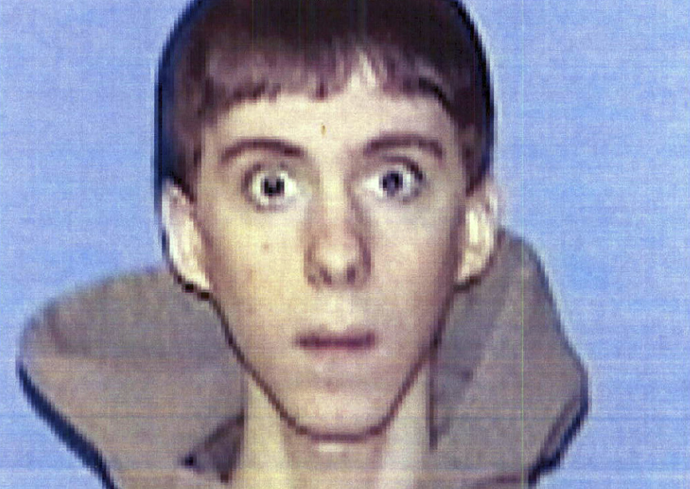 FILE - This undated identification file photo provided Wednesday, April 3, 2013, by Western Connecticut State University in Danbury, Conn., shows former student Adam Lanza, who authorities said opened fire inside the Sandy Hook Elementary School in Newtown, Conn., on Friday, Dec. 14, 2012, killing 26 students and educators. State police said their report from the investigation into last year's Newtown school massacre will be released at 3 p.m. Friday, Dec. 27, 2013. (AP Photo/Western Connecticut State University, File)