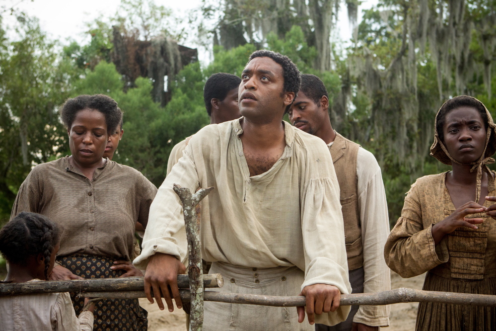 “12 Years a Slave,” starring Chiwetel Ejiofor, center, is among several films directed by black filmmakers and/or starring black actors that are expected to be in the Oscar race this year.
