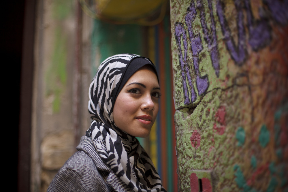 Rapper Myam Mahmoud, 18, poses for a portrait in Cairo on Dec. 10. “We cannot stay silent,” about challenges facing girls and women, she says.