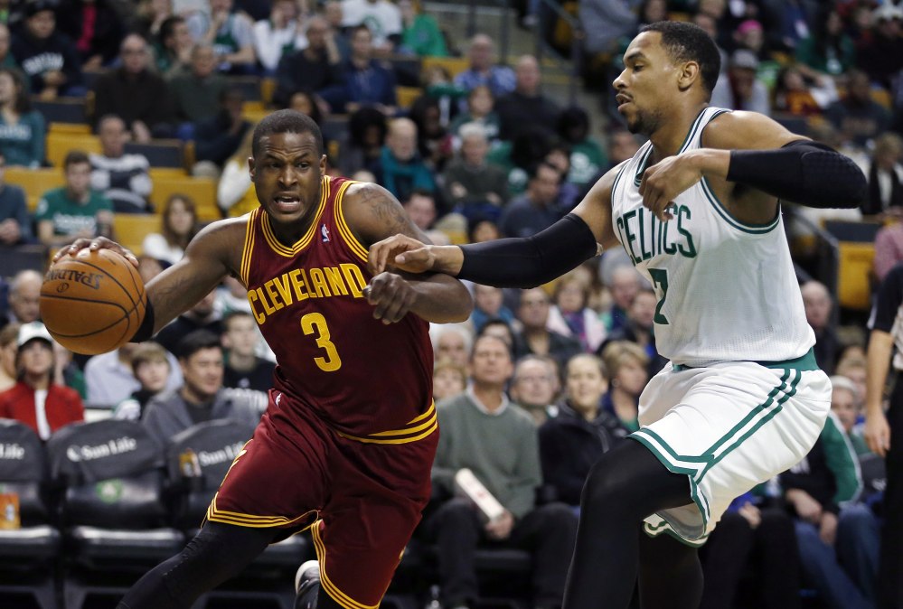 Cleveland Cavaliers’ Dion Waiters drives past Boston Celtics’ Jared Sullinger in the second quarter Saturday in Boston.