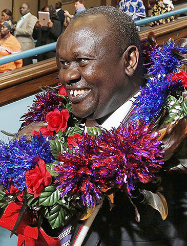 Rick Machar, vice president of South Sudan, is greeted during his visit to Portland in October 2012.