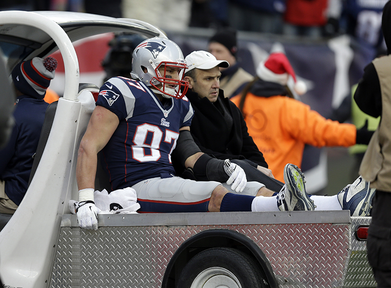 New England Patriots tight end Rob Gronkowski leaves the field in a cart after being injured in the third quarter against the Cleveland Browns Sunday in Foxborough, Mass.