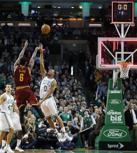 Cleveland Cavaliers' Earl Clark fails to make a 3-pointer over Boston Celtics' Avery Bradley with no time left on the clock in the fourth quarter of Saturday's game in Boston. The Celtics won 103-100.