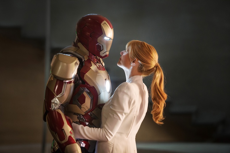 This film publicity image released by Disney-Marvel Studios shows Robert Downey Jr. as Tony Stark/Iron Man and Gwyneth Paltrow as Pepper Potts with in a scene from "Iron Man 3." Hollywood is expected to have a banner year as box office totals are projected to peak at just under $11 billion, bringing in more multiplex revenue in 2013 than ever before.