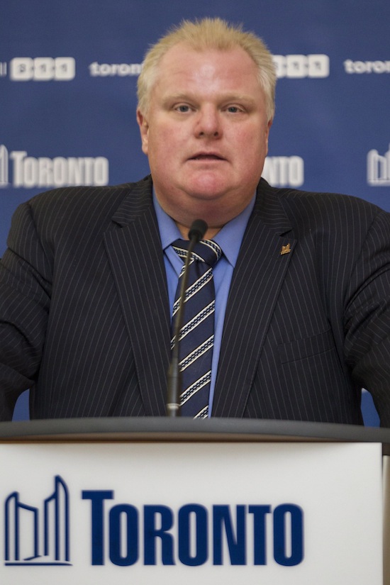 Toronto Mayor Rob Ford attends a news conference at City Hall in Toronto on Tuesday Dec. 10 2013. Ford says he stands by every word he said during a televised interview in which he appeared to accuse a reporter of being a pedophile.