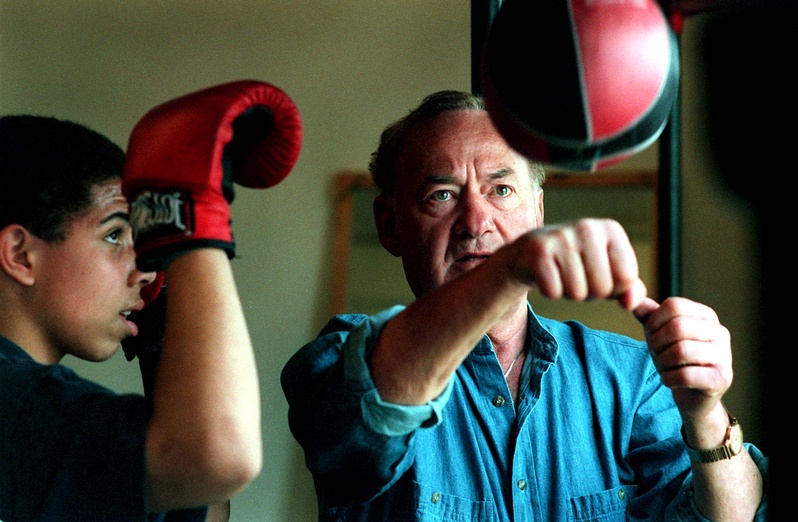 Richard "Dick" Potvin shows Justin King the timing necessary to work on the speedbag at the Southern Maine Boxing Club in 1997. Potvin, who started the club, died Dec. 4. Gregory Rec