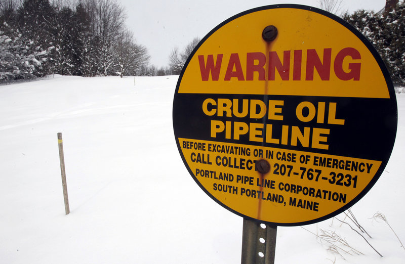 In this March 2013 file photo, a sign marks the location of an Portland Pipe Line oil pipeline in Irasburg, Vt. The South Portland City Council took its first concrete step Monday toward prohibiting Canadian oil sands from being shipped through the city’s port by the Portland Pipe Line Co.
