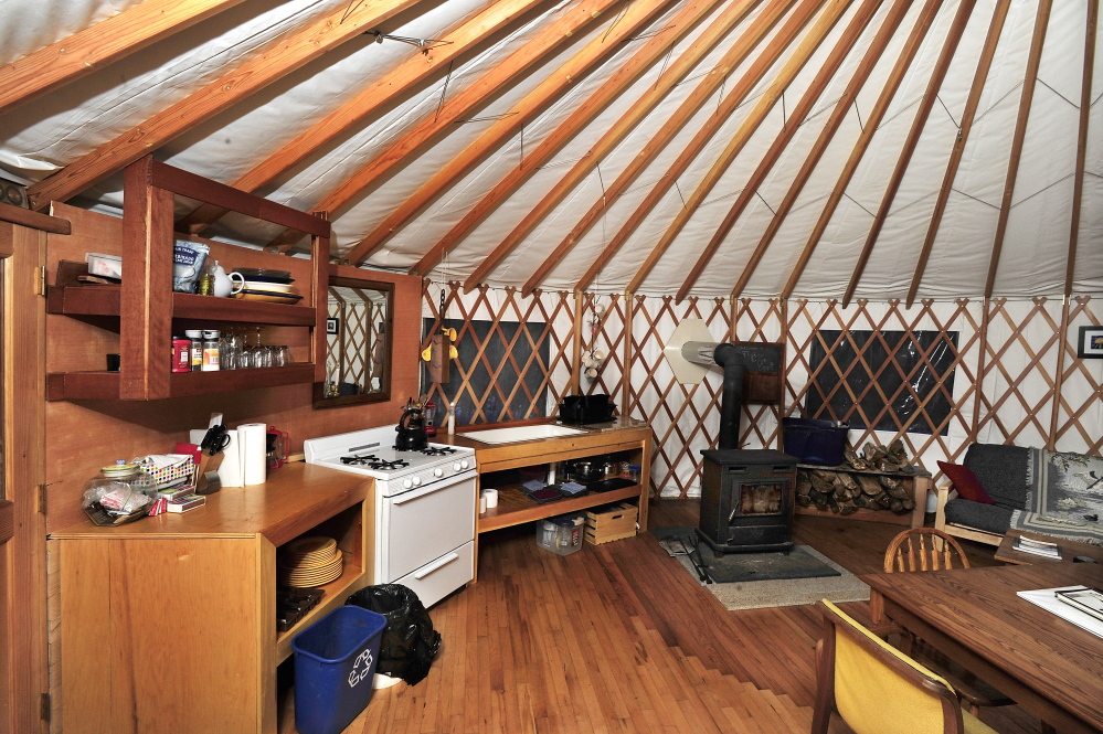 Yurts have an unusual wall and roofing system and a dome that lets in light. The yurt is built on decks of hardwood.