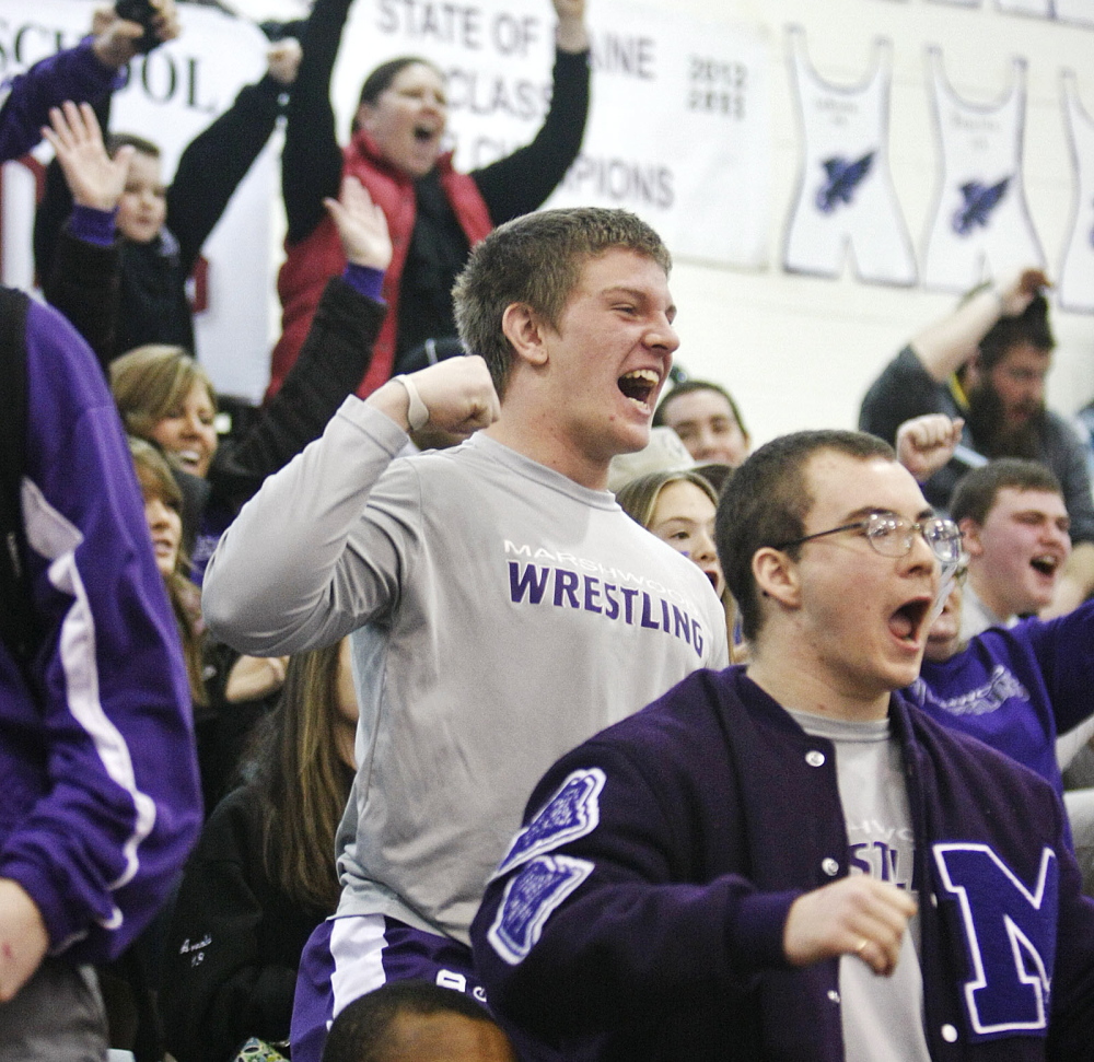 Marshwood fans celebrate during the Class A state wrestling tournament at Noble High School in North Berwick on Saturday.