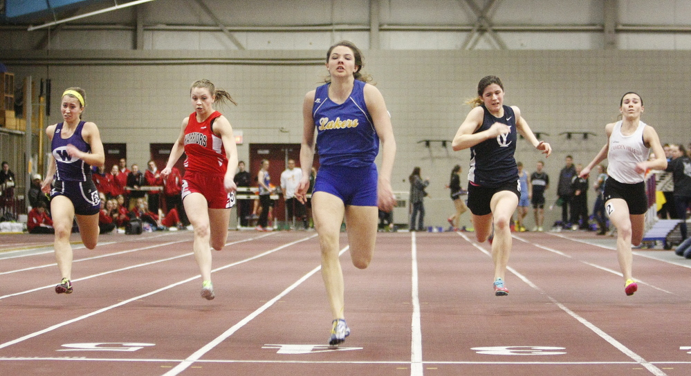 Kate Hall of Lake Region wins the 55-meter dash Monday at the Class B indoor track and field championships at Bates College. Hall set meet records in the 55, 200 and long jump.