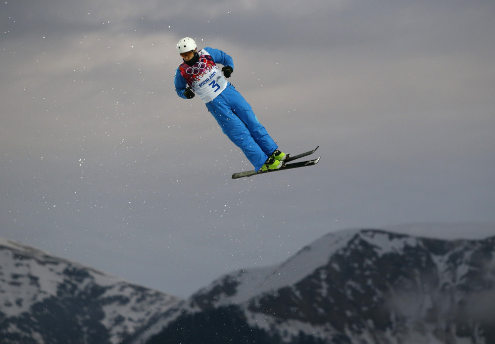Anton Kushnir of Belarus jumps during men’s freestyle skiing aerials qualifying at the Rosa Khutor Extreme Park, at the 2014 Winter Olympics on Monday in Krasnaya Polyana, Russia.