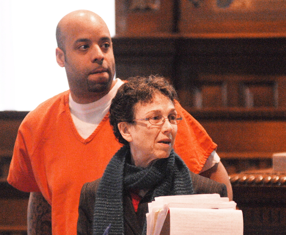 pharmacy robberies: Michael Pierce, 33, of Augusta, who was sentenced on two pharmacy robbery charges, stands with his attorney Sherry Tash on Wednesday at Kennebec County Superior Court in Augusta.