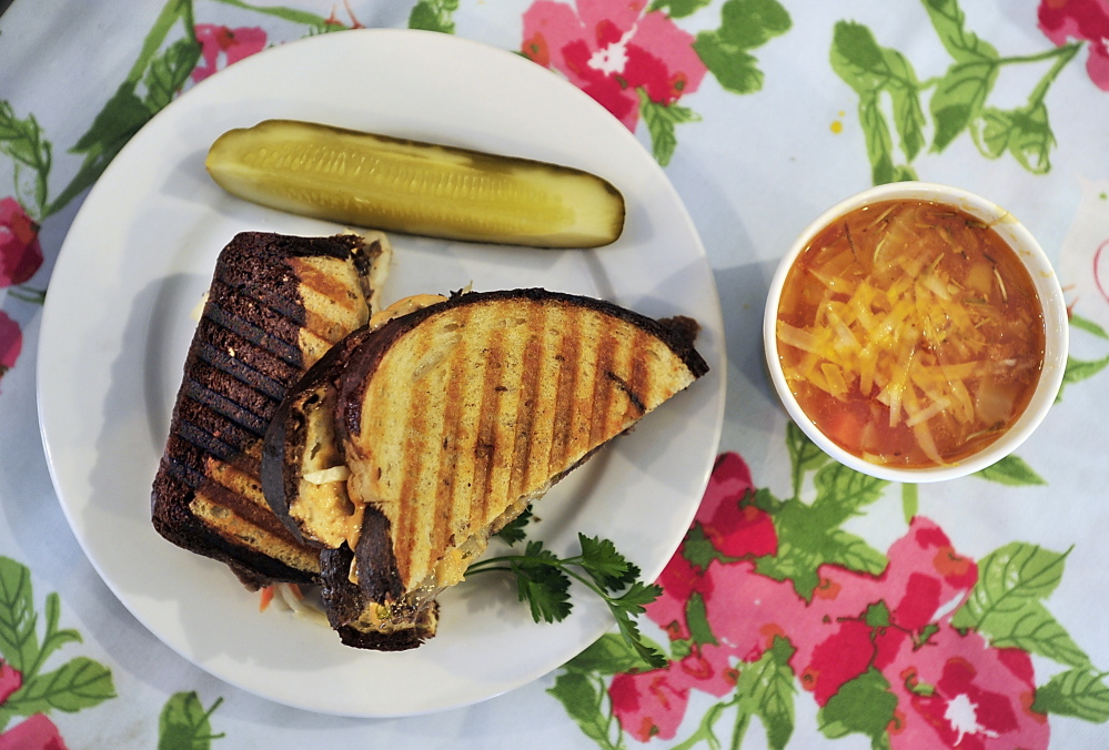 At Highland Avenue Greenhouse & Farm Market, the Reuben is made with nitrate-gree corned beef, Swiss cheese and crunchy slaw. It's shown with a side of Peasant Tuscan Soup.