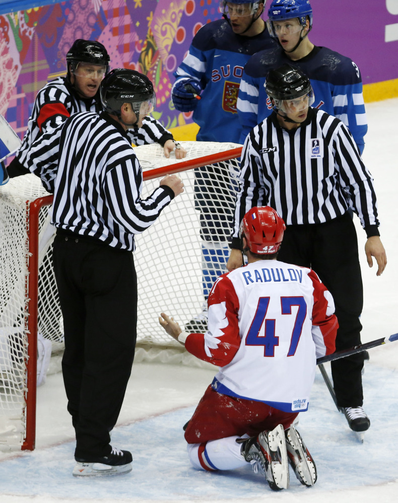 Russia forward Alexander Radulov appeals to officials after trying to score on Finland goaltender Tuukka Rask in the third period of a men’s quarterfinal ice hockey game at the 2014 Winter Olympics, Wednesday, Feb. 19, 2014, in Sochi, Russia.