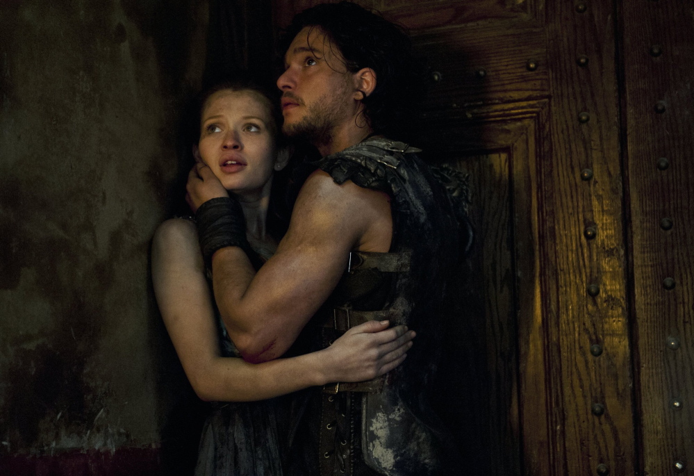 Emily Browning, left, and Kit Harington star in "Pompeii."