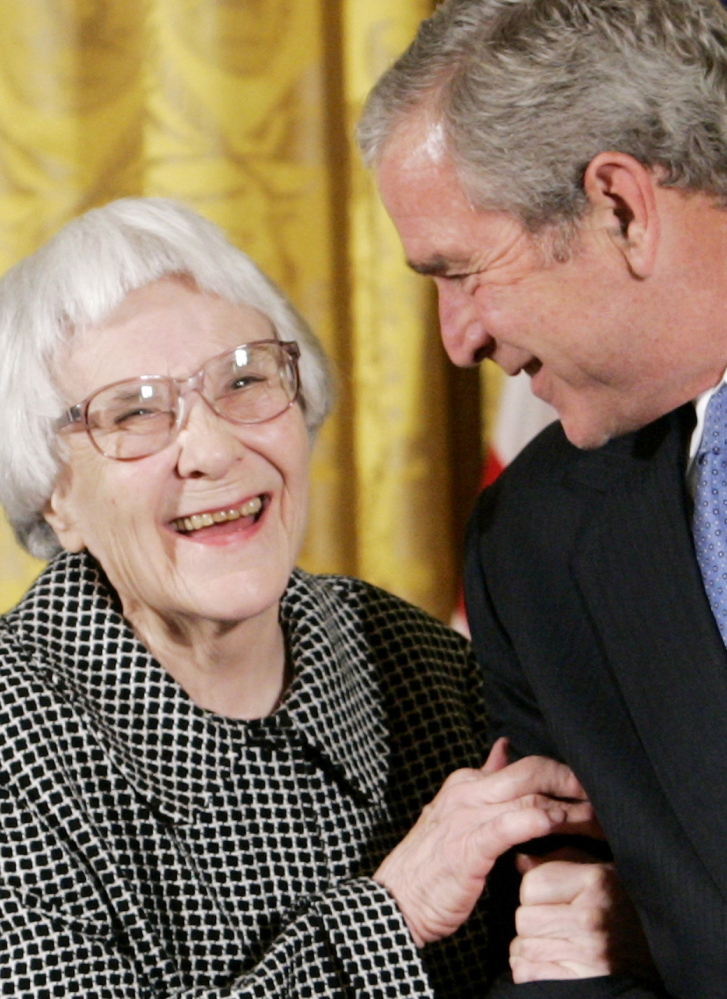 President George W. Bush greets Harper Lee in 2007. Her “To Kill a Mockingbird” is considered a modern classic.