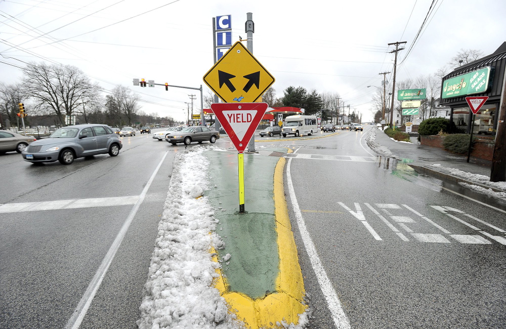 This yield sign for the slip lane at the Five Points intersection has been replaced with a traffic light, and “no turn on red” signs have been posted.