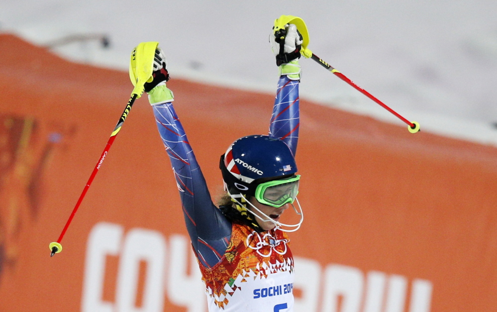Gold medal winner Mikaela Shiffrin of the United States celebrates as she finishes the second run of the women’s slalom at the Sochi 2014 Winter Olympics Friday.