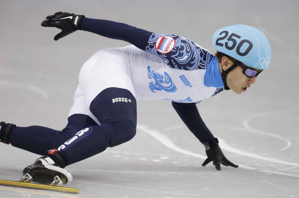 Viktor Ahn of Russia competes in the men’s 500-meter short track speedskating final at the Iceberg Skating Palace during the 2014 Winter Olympics on Friday in Sochi, Russia.