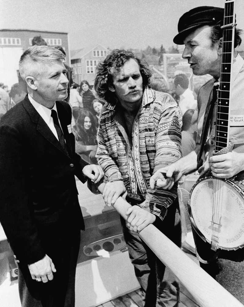 Gov. Kenneth Curtis left, and folk singer Pete Seeger attend the 1969 launching of the sloop Clearwater at South Bristol.