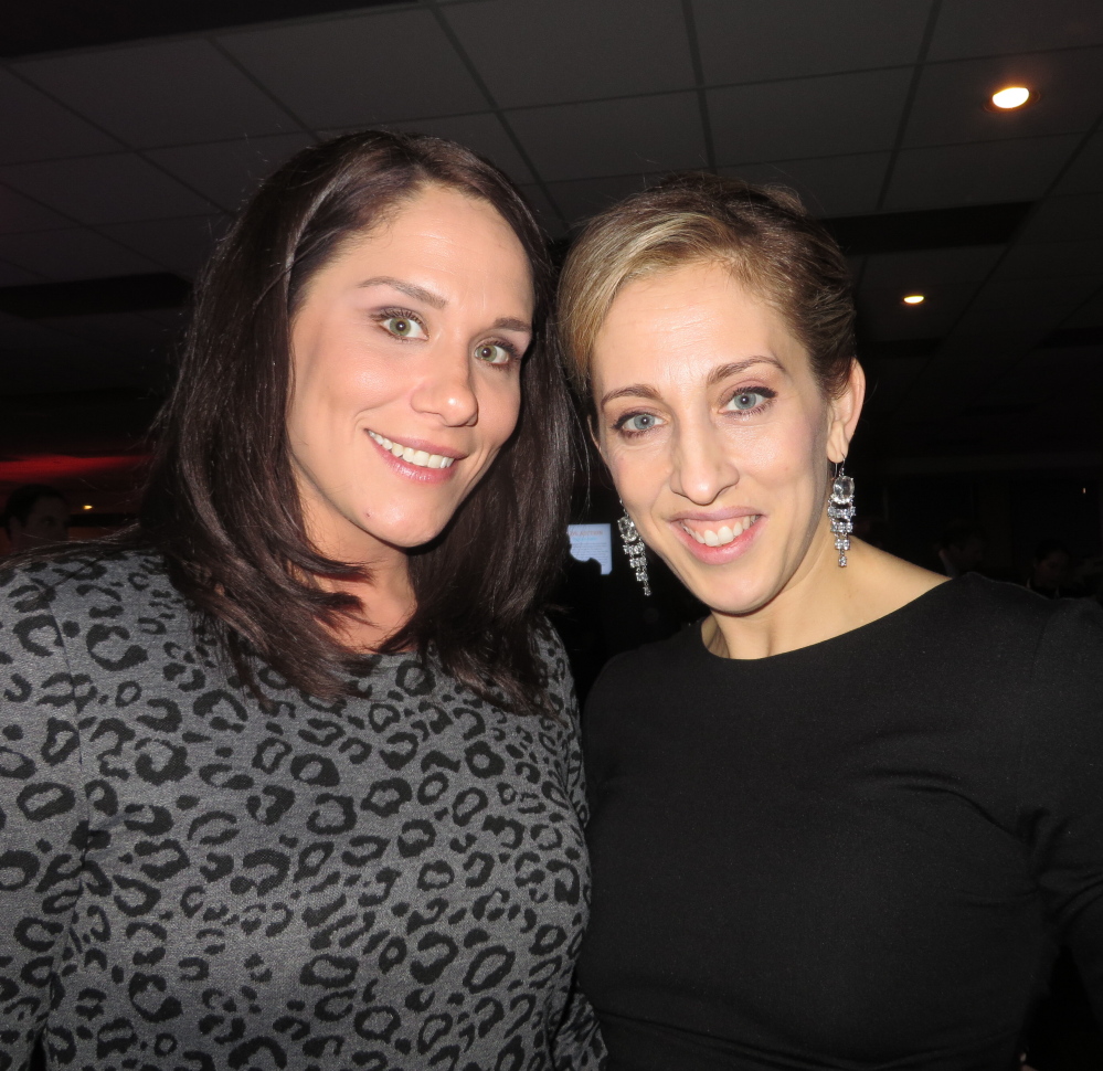 Lianna Doane, manager of special events, with silent auction chairperson Katie Hogan, both of Falmouth.