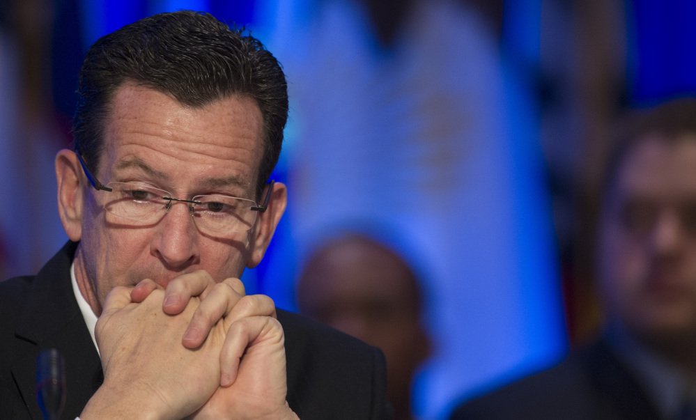 Connecticut Gov. Dannel Malloy participates in a special session on jobs in America during the National Governors Association winter meeting in Washington on Sunday.