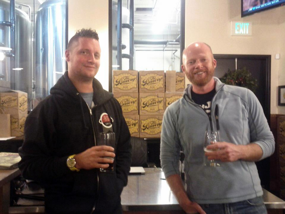 Matthew Mills, left, and Chris Schofield, pictured at The Bruery tasting room in California, plan to open Barreled Souls Brewing in Saco this spring in a building on Route 1.