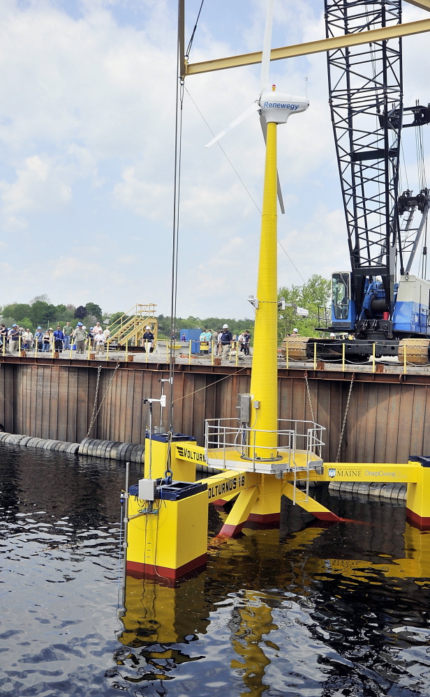 A prototype floating wind turbine put together by the DeepCwind Consortium sits in water at Cianbro’s Eastern Manufacturing Facility in Brewer on May 13.