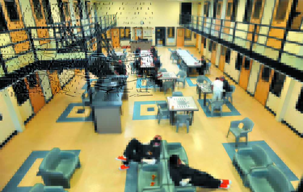 Inmates occupy the day room of the medium-security wing at the Somerset County Jail in East Madison last winter. At issue in the case was the control of revenue from boarding federal prisoners.