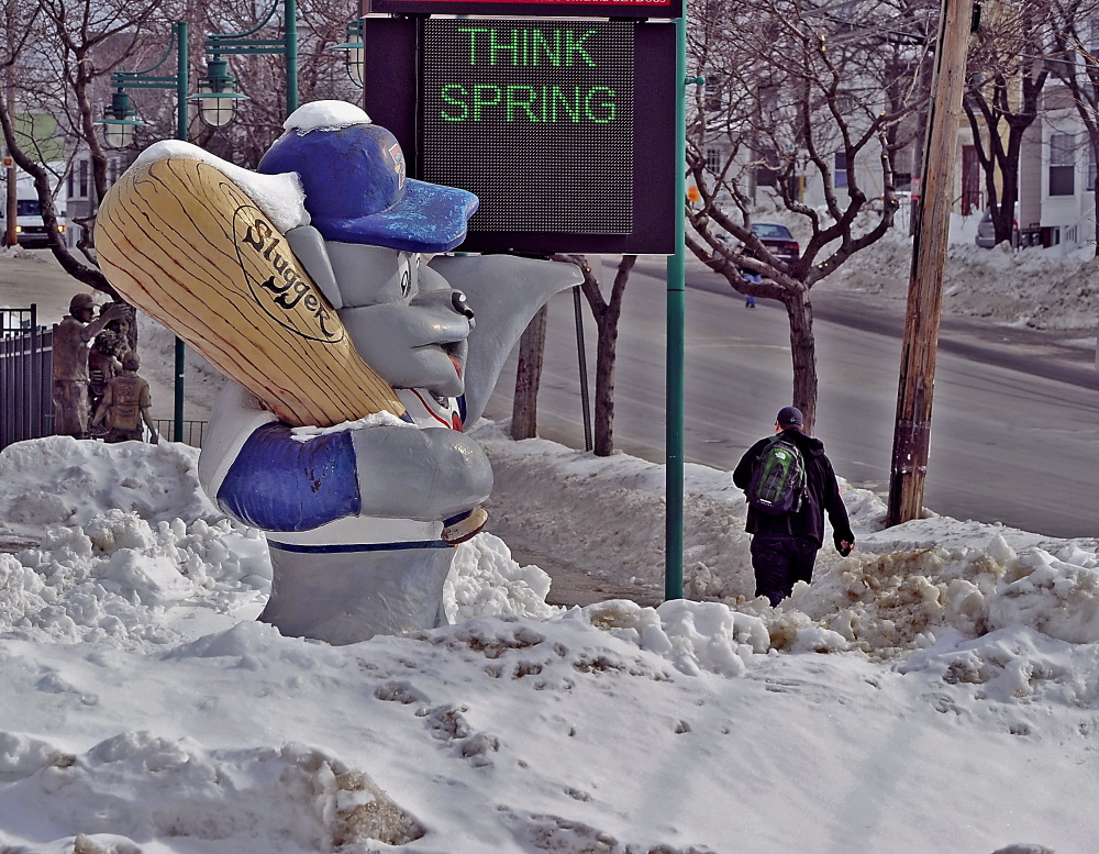 It’s hard to “think spring” when the snow is waist-high on Slugger, the Portland Sea Dog’s mascot in front of Hadlock Field on Park Avenue in Portland. But thinking about spring might just give Portlanders some hope in what has been an extreme winter, according to one index.