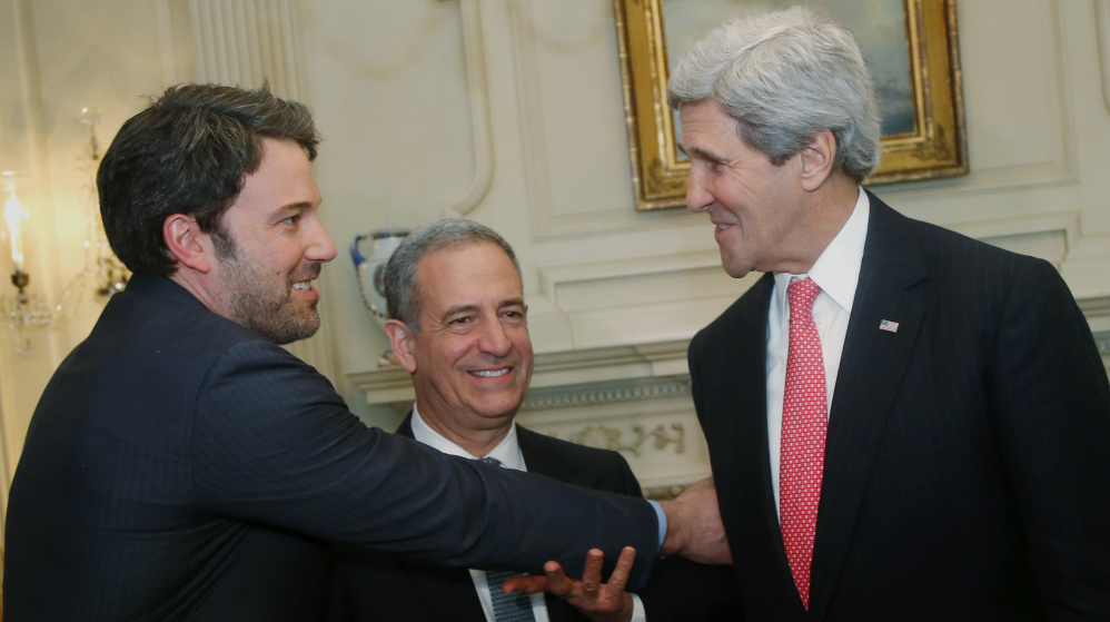 Ben Affleck, from left, ex-Sen. Russ Feingold, the special envoy for the African Great Lakes region, and Secretary of State John Kerry meet Wednesday in Washington.