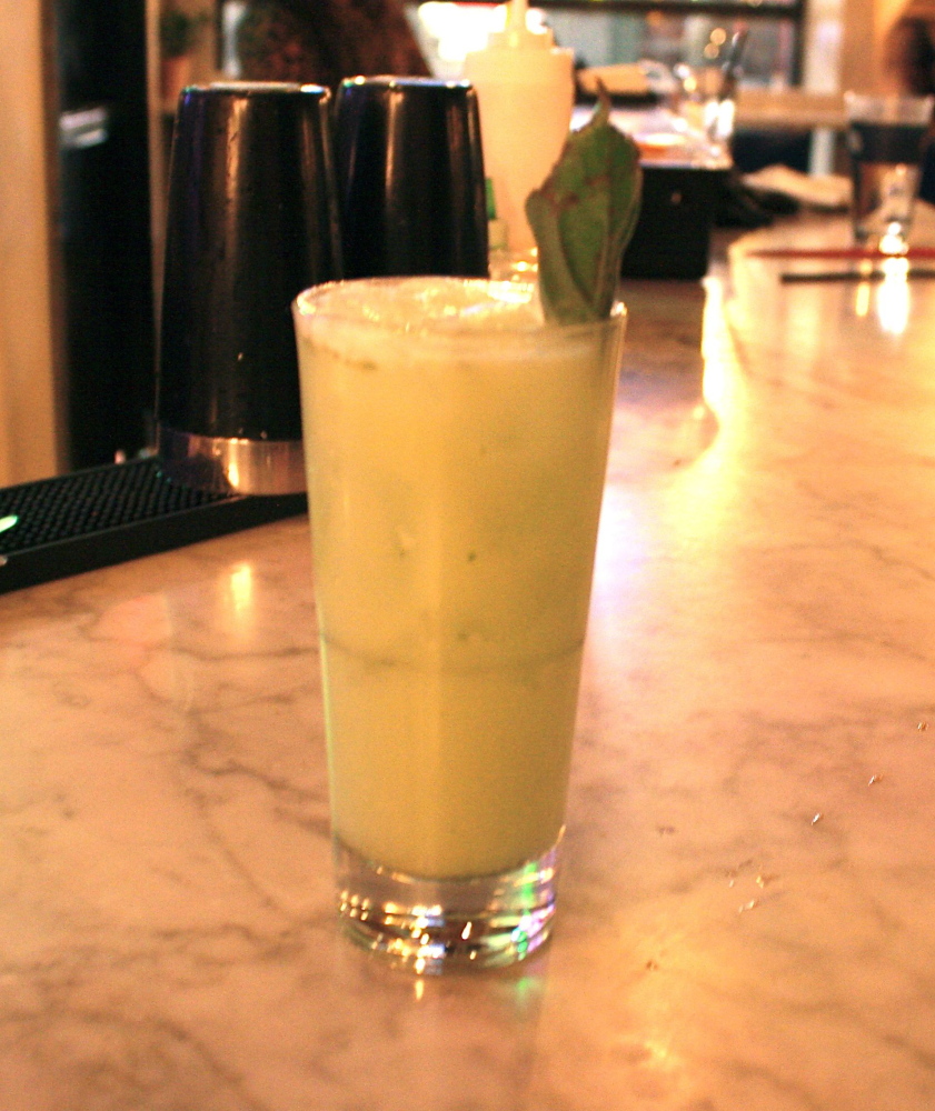 A popular drink at Empire, Dragon’s Milk is a mix of coconut milk, green tea-infused gin, pandan syrup and Thai basil leaves.