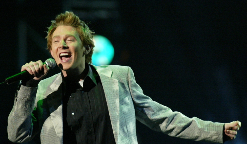 Singer Clay Aiken performs onstage at the 31st annual American Music Awards in Los Angeles in 2003.