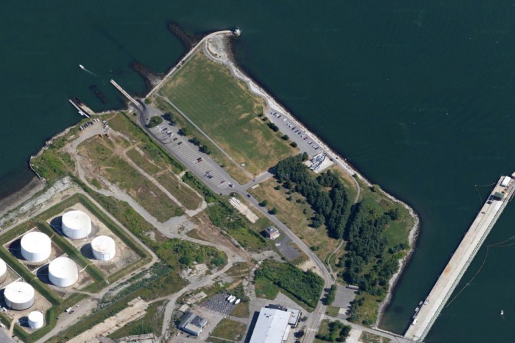 L+R Northpoint, a holding company of PK Realty Management, has purchased 30 acres of former shipyard property in South Portland. In this 2014 file photo, a portion of the property appears just above and to the right of the oil tanks. Bug Light Park is at top in photo.