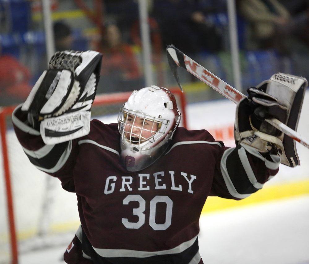 Greely goalie Kyle Kramlich celebrates after the Rangers defeated Camden Hills 3-2 Friday night in a Western Class B boys’ hockey semifinal at the Colisee in Lewiston.