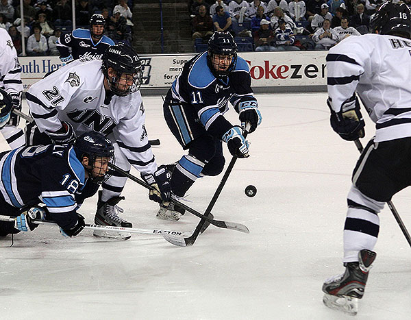 Brothers in arms and by birth, Jon Swavely, bottom left, and Steven Swavely sometimes play on the same line for UMaine, though center is their regular position.