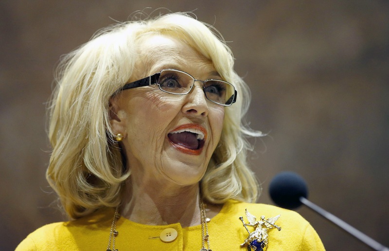 Arizona Gov. Jan Brewer on Wednesday vetoed a Republican bill that set off a national debate over gay rights, religion and discrimination and subjected Arizona to blistering criticism from major corporations and political leaders from both parties.
