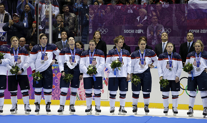 Team USA reacts after receiving their silver medals after losing to Canada 3-2 in overtime of the gold medal women's ice hockey game at the 2014 Winter Olympics, Wednesday, Feb. 19, 2014, in Sochi, Russia. (AP Photo/David Goldman) 2014 Sochi Olympic Games;Winter Olympic games;Olympic games;Spor