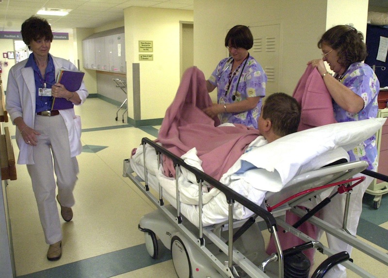 In this 2005 file photo, nurses care for a patient at Maine Medical Center in Portland. Maine Democrats and several Republicans hope hospitals can help successfully push for MaineCare expansion in 2014, but some Republicans question hospitals' claims that expansion will help ease their financial burdens.
