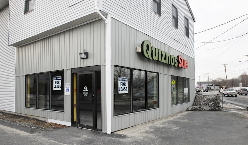 In this March 2007 file photo, a recently closed Quiznos at 726 Forest Ave. in Portland, Maine. Denver-based Quiznos has filed for Chapter 11 bankruptcy protection to reduce its debt by more than $400 million after the chain lost ground to its competitors. Fast food