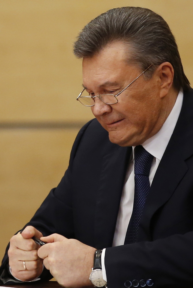 Ousted Ukrainian President Viktor Yanukovych speaks in Russia on Friday. It was his decision to make a trade deal with Russia instead of the EU that ignited the latest revolution in Ukraine.